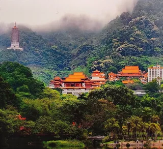 Temple architecture and green hills on the Guangzhou cultural route